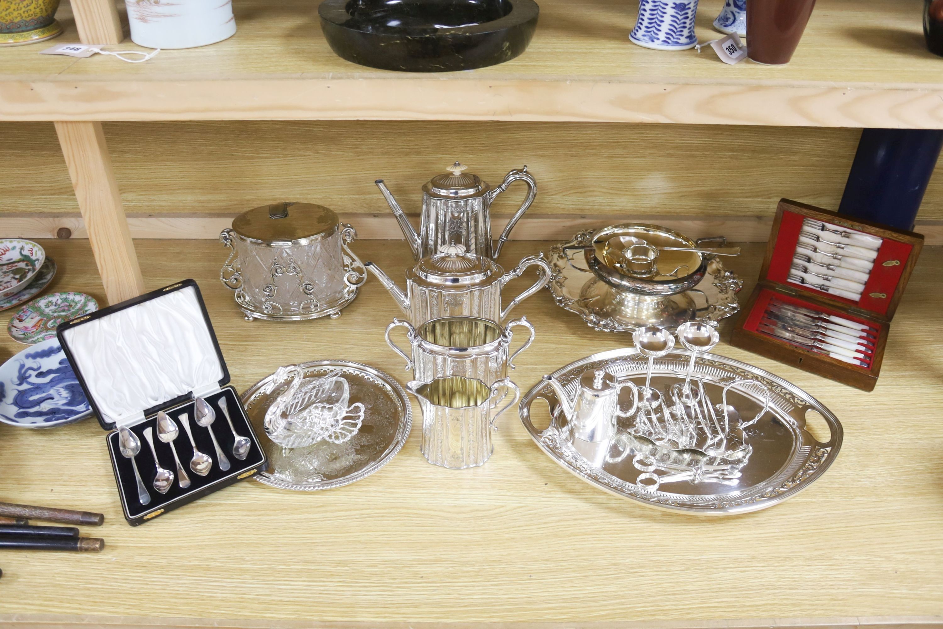 A Victorian cut glass and electroplate biscuit box and other plated wares